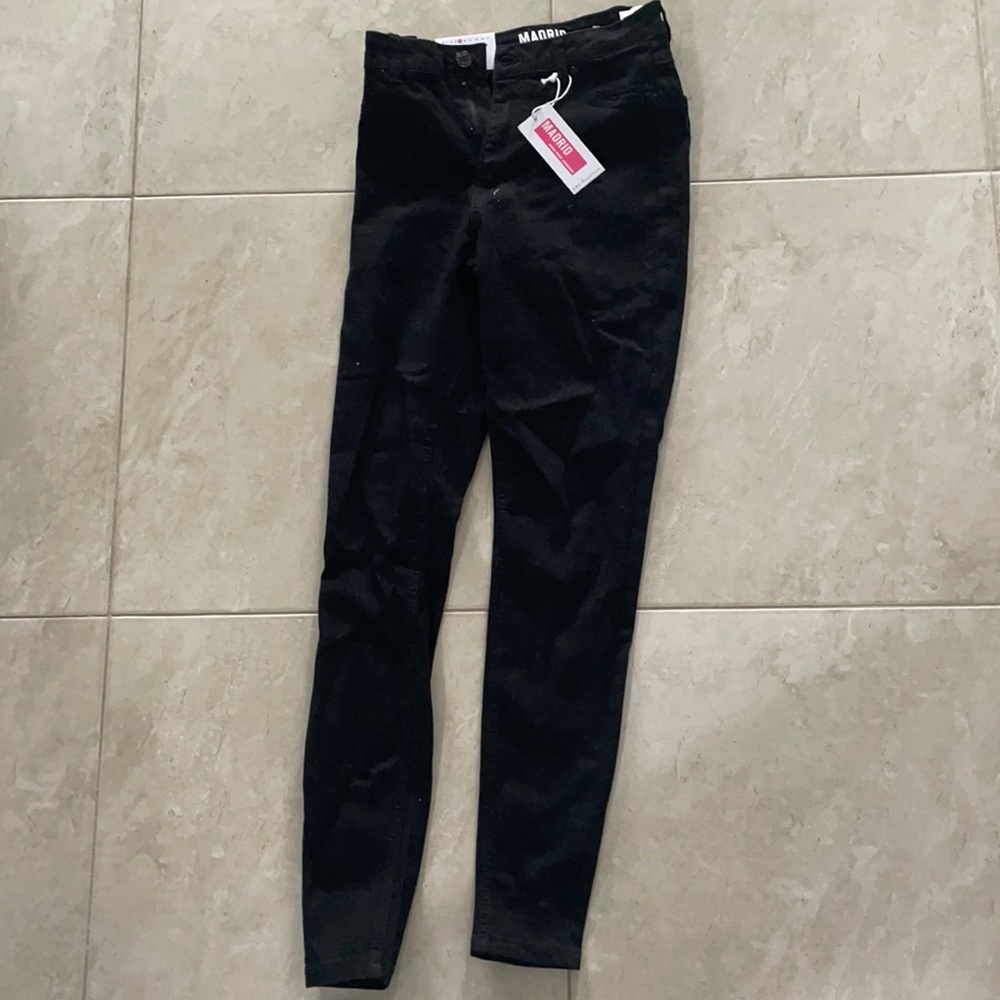 High rise black spray on jeans